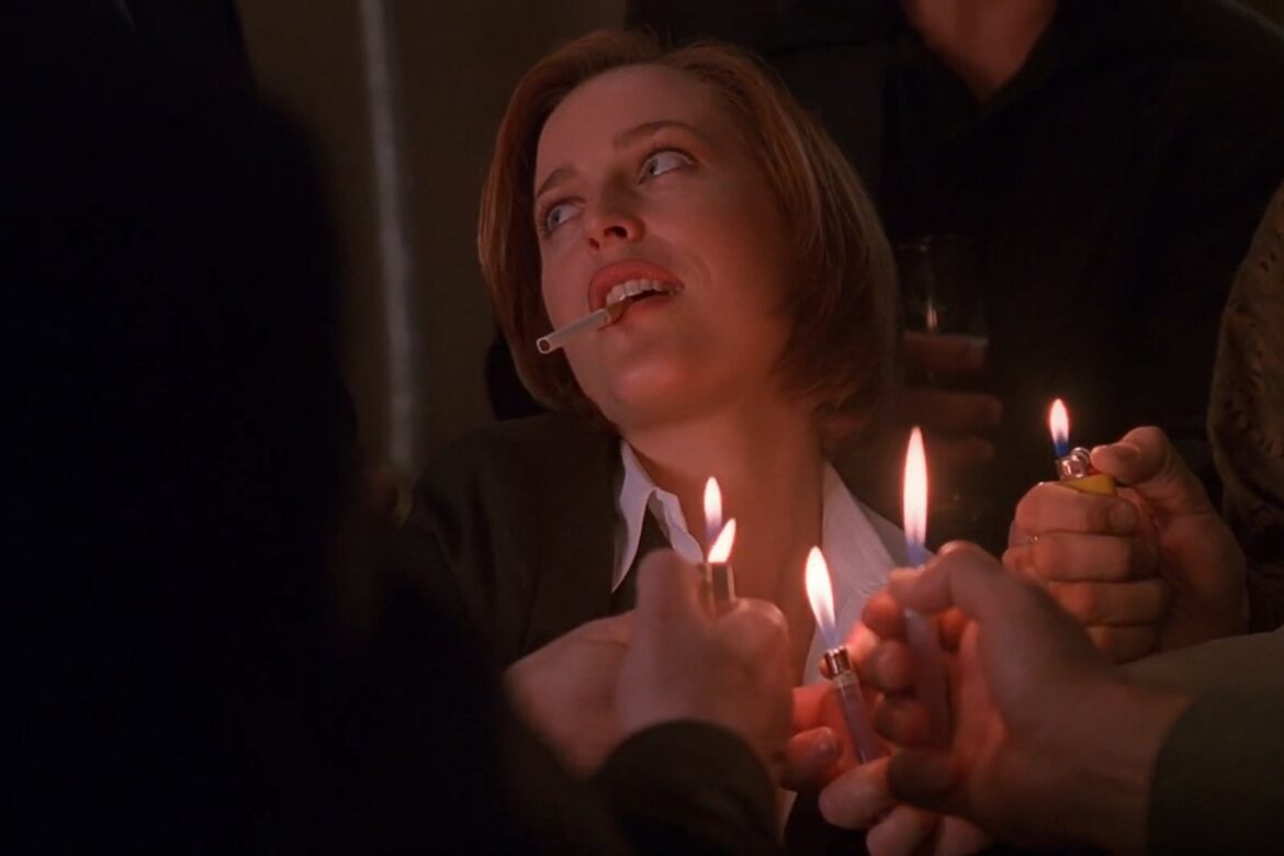 Gillian Anderson as Agent Dana Scully.