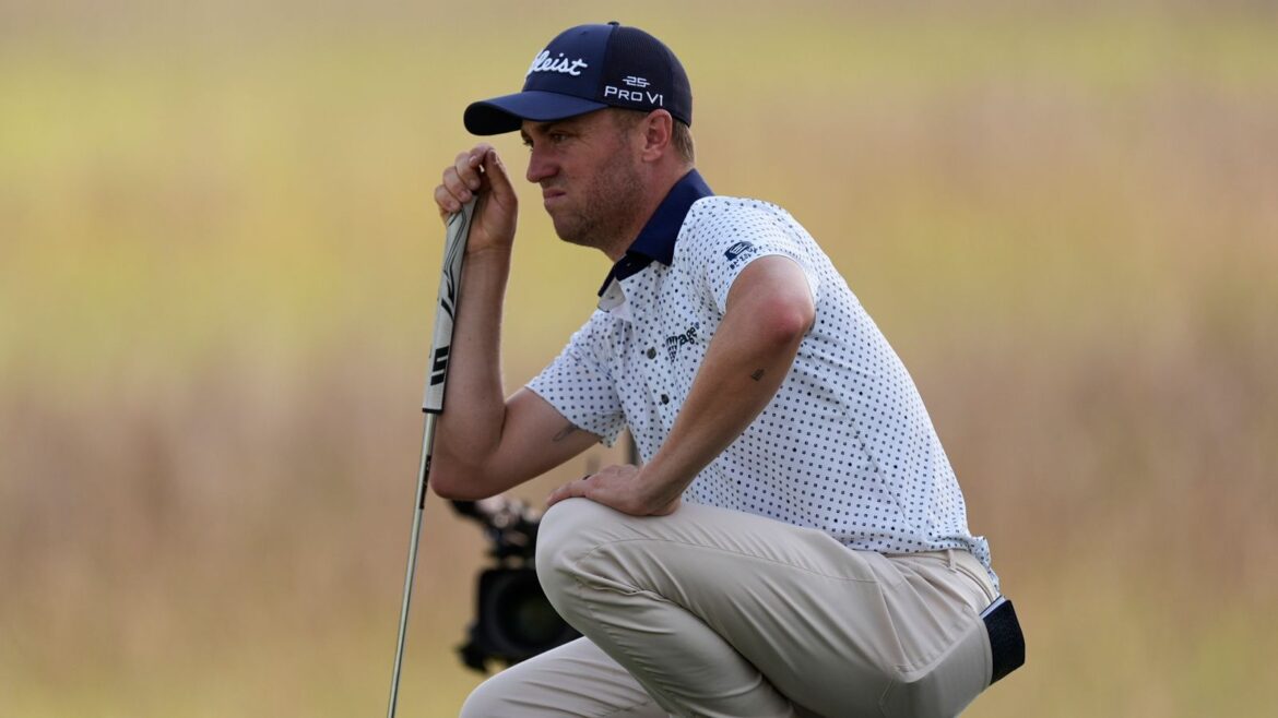 Justin Thomas lines up a putt on the 17th green during the second round of the RBC Heritage golf tournament, Friday, April 18, 2025, in Hilton Head Island, S.C. (AP Photo/Mike Stewart)